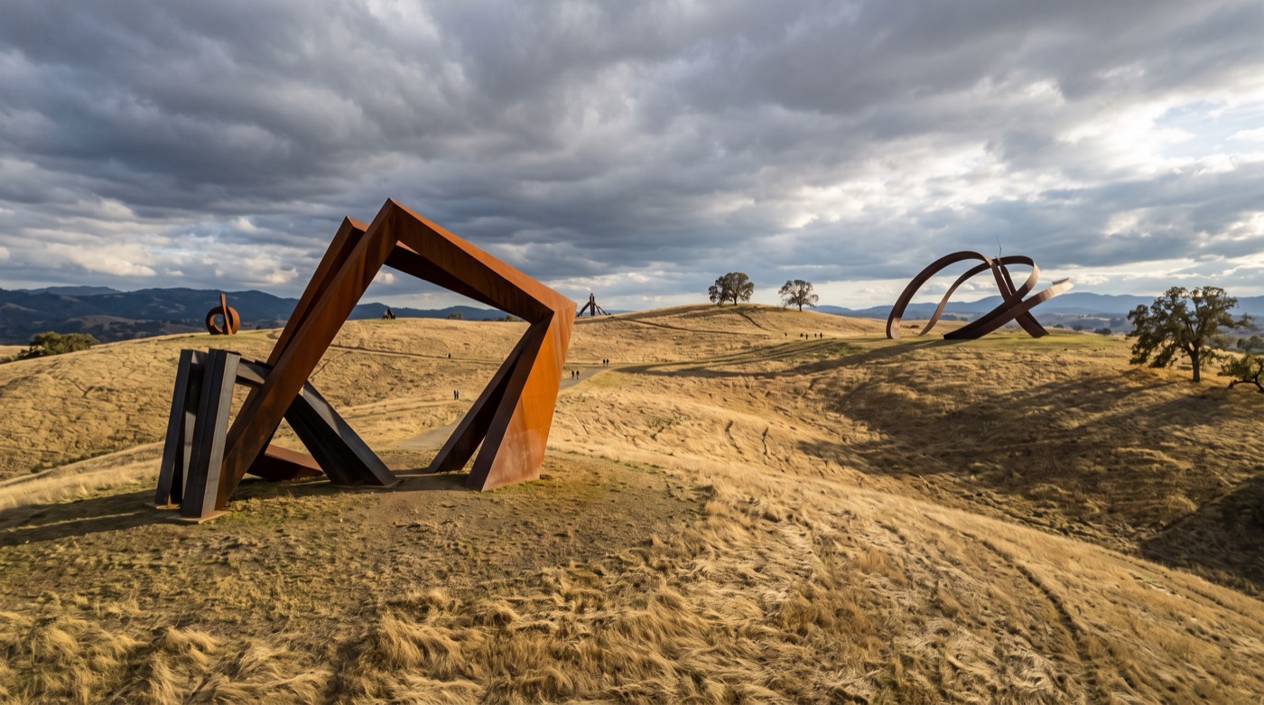 Oversized abstract sculptures spread across rolling autumn hills at Storm King Art Center in the Hudson Valley