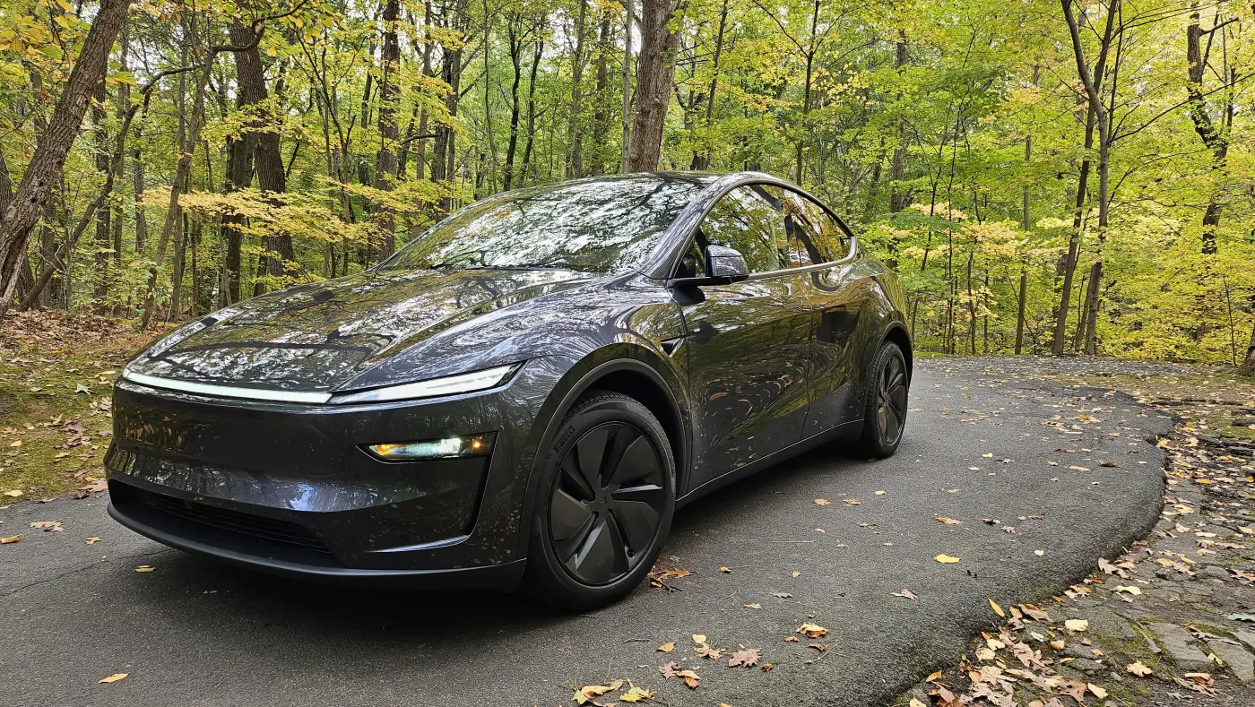 2026 Tesla Model Y among autumn foliage
