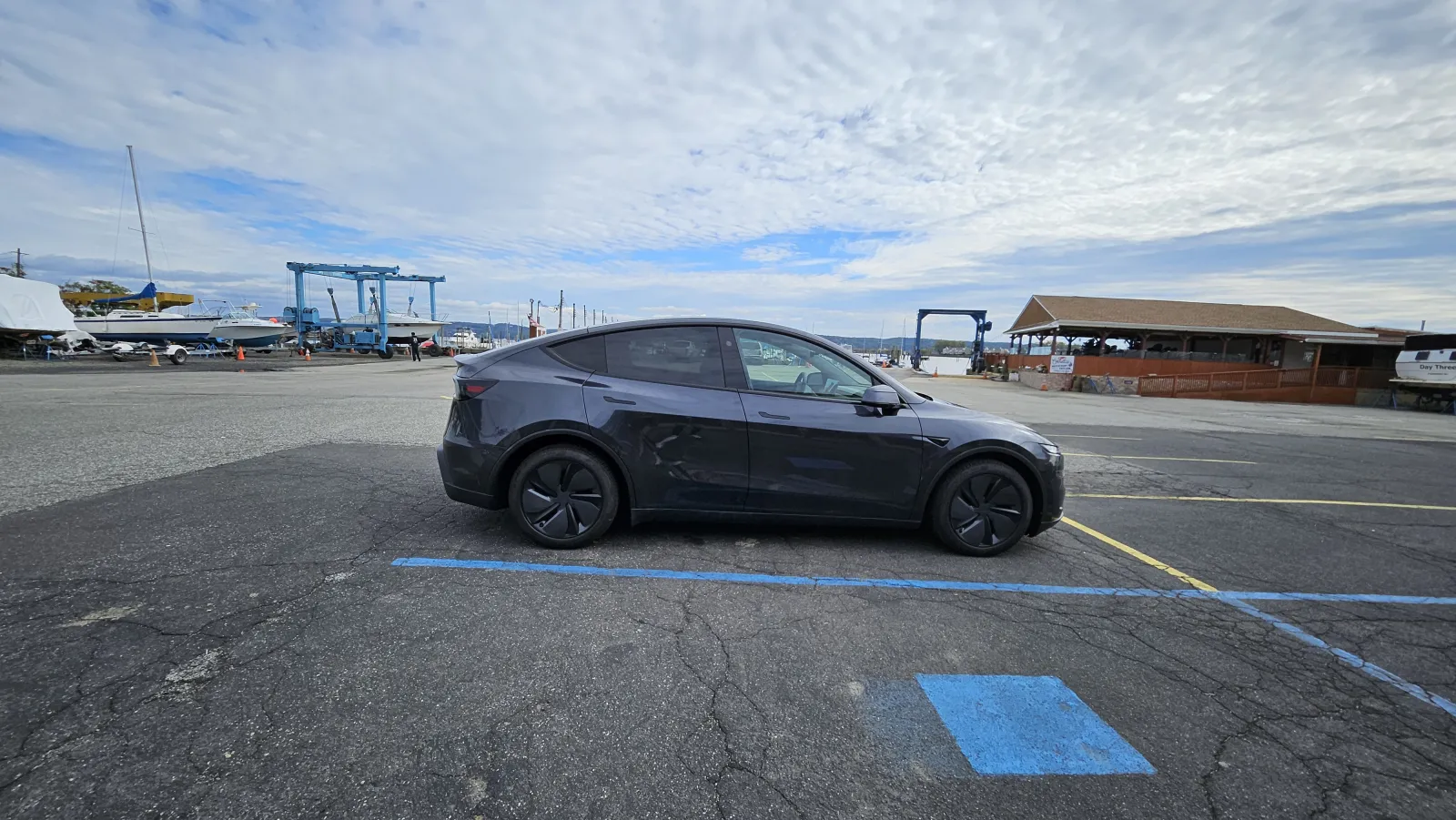 2026 Tesla Model Y on a scenic road